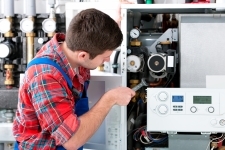 Technician servicing the gas and liquid flow meters